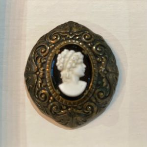 Antique Oval Brass Cameo fur/scarf lapel pin
1915-1920’s 
Celluloid molded